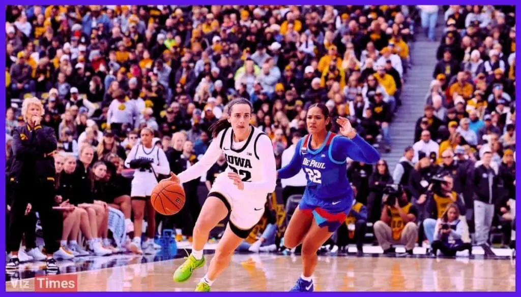 Iowa's Caitlin Clark dribbles past a DePaul defender during a college basketball game